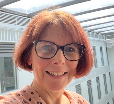 A person smiling for a selfie AI-generated content may be incorrect.